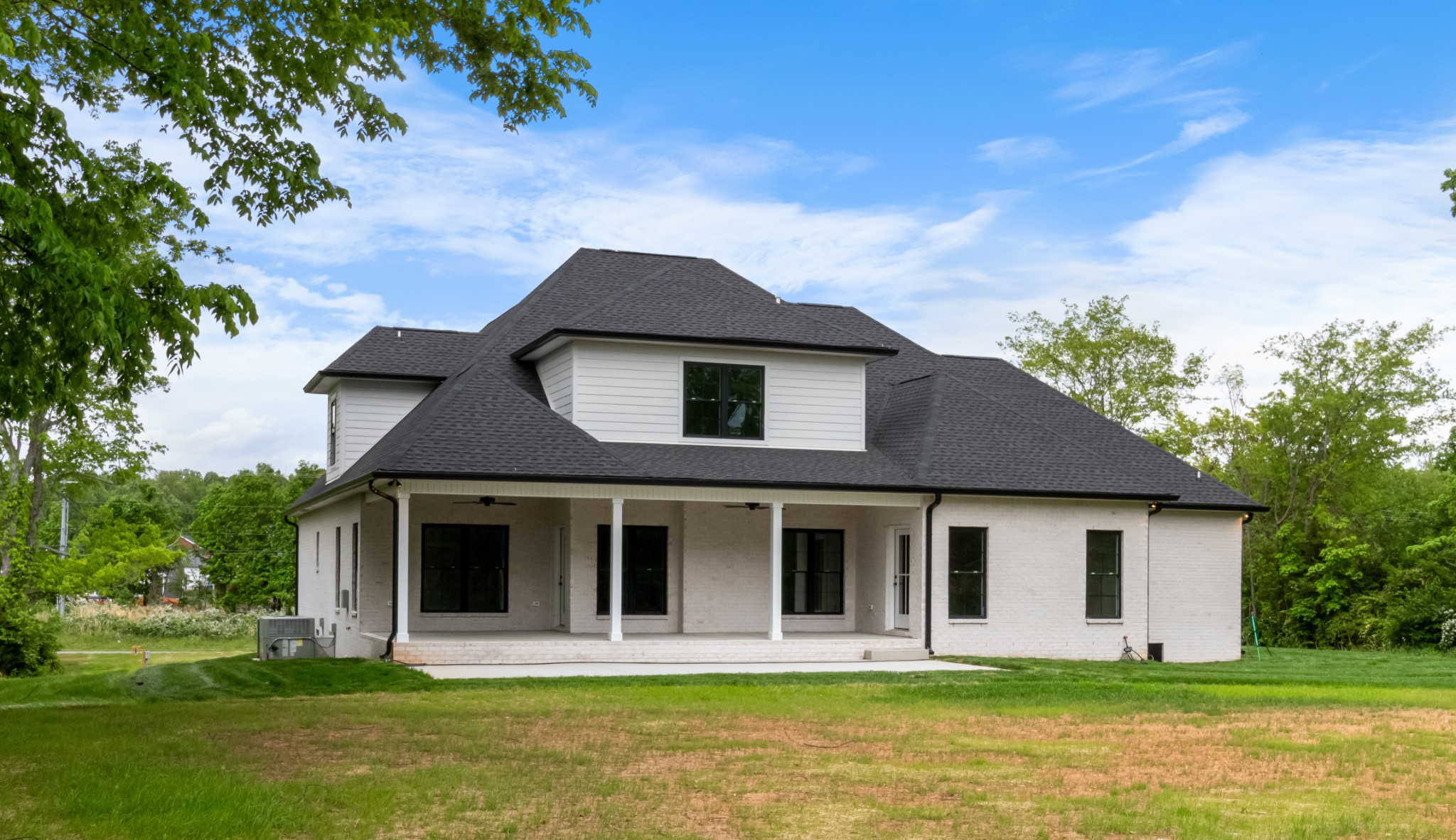 3600 Trough Springs Road Adams, TN 37010 - Photo 53 of 54 a front view of a house with garden