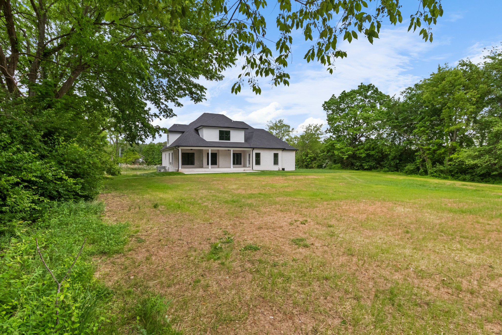 3600 Trough Springs Road Adams, TN 37010 - Photo 54 of 54 a house with a garden
