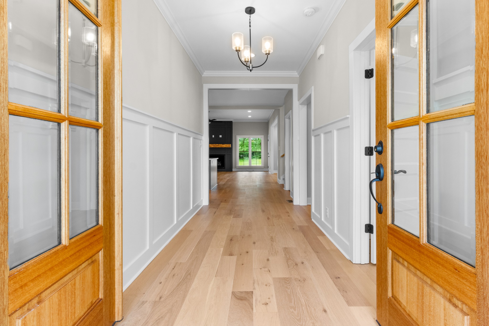 3600 Trough Springs Road Adams, TN 37010 - Photo 9 of 54 a view of a hallway with wooden floor and staircase