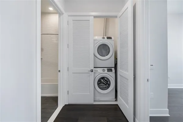 a utility room with dryer and washer