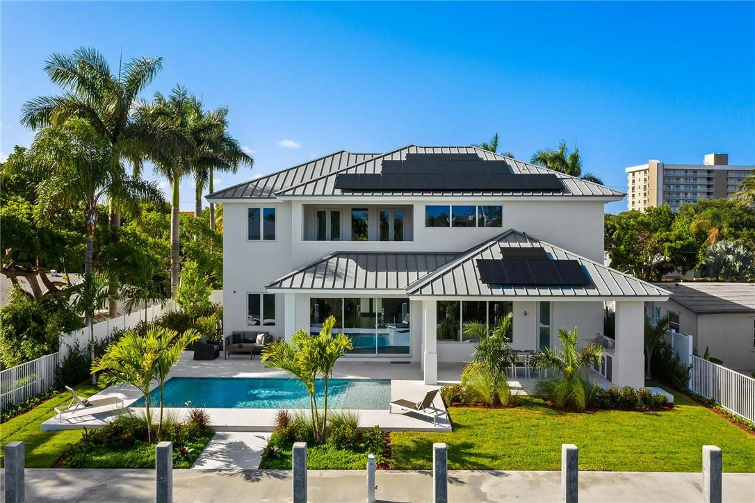 3204 Dover Road Pompano Beach, FL 33062 - Photo 28 of 73 Back View Of Property With Solar Panels