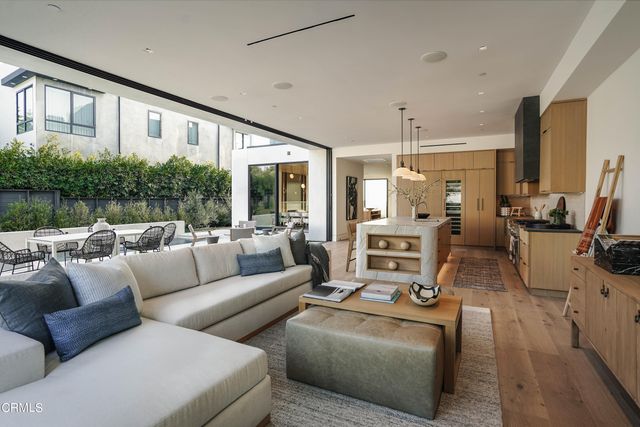 a view of swimming pool with outdoor seating and yard