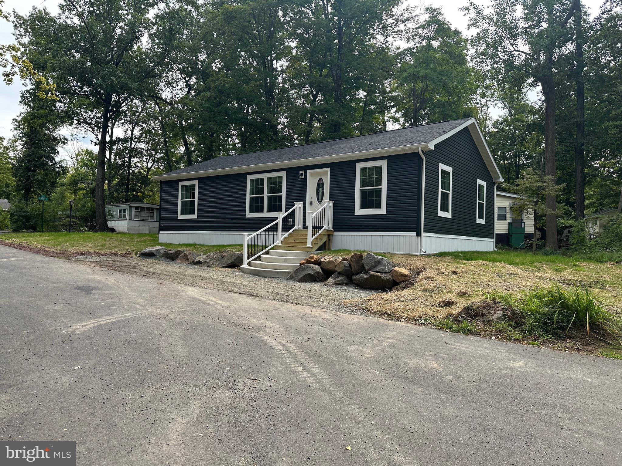 5 Beth Lane Quakertown, PA 18951 - Photo 1 of 12 a view of a house with backyard