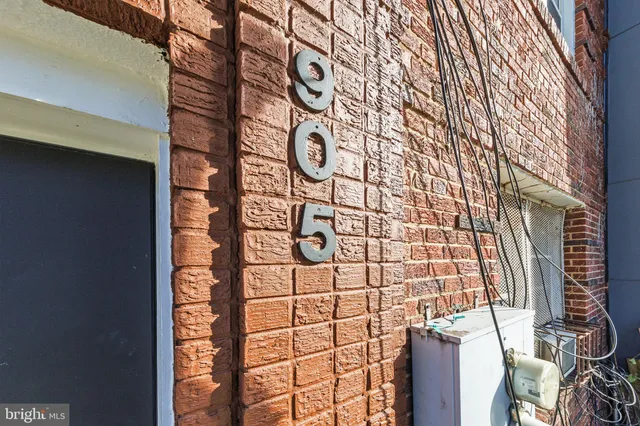a bathroom with a shower and a window