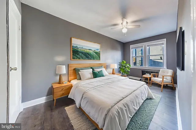 a bedroom with bed and window