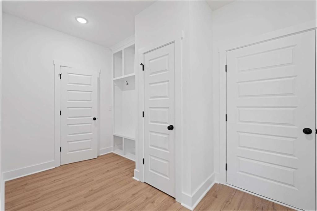 11691 Hazelbrand Road Northeast Covington, GA 30014 - Photo 26 of 53 wooden floor in an empty room
