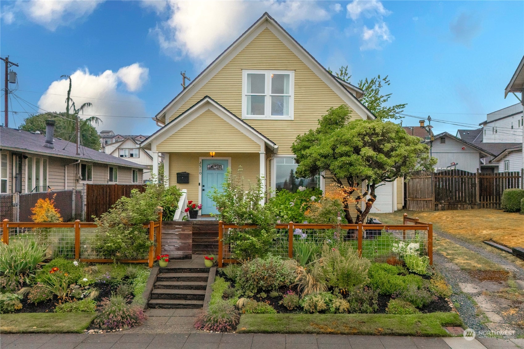 2510 Rockefeller Avenue Everett, WA 98201 - Photo 1 of 40 a front view of a house with garden