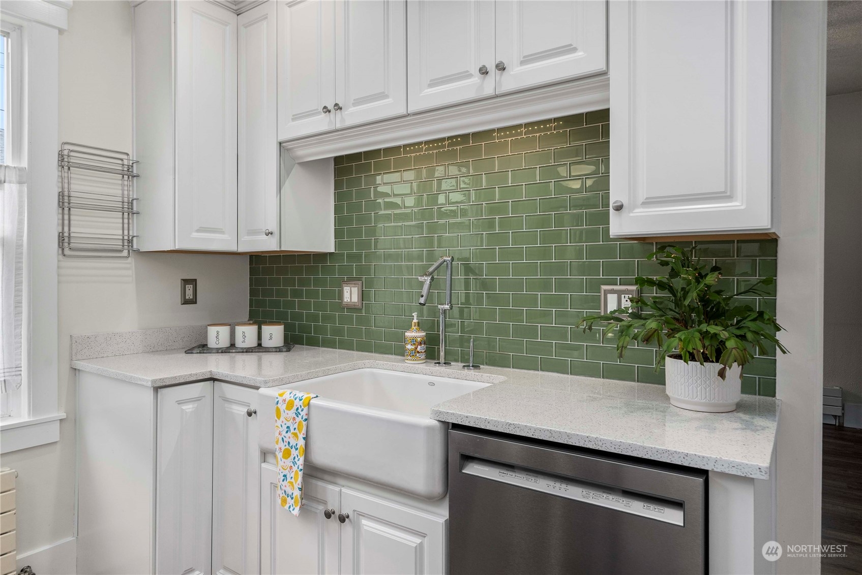 2510 Rockefeller Avenue Everett, WA 98201 - Photo 12 of 40 a kitchen with a sink and cabinets