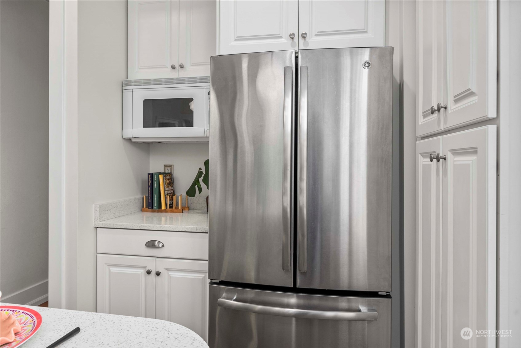 2510 Rockefeller Avenue Everett, WA 98201 - Photo 13 of 40 a kitchen with stainless steel appliances a refrigerator and cabinets