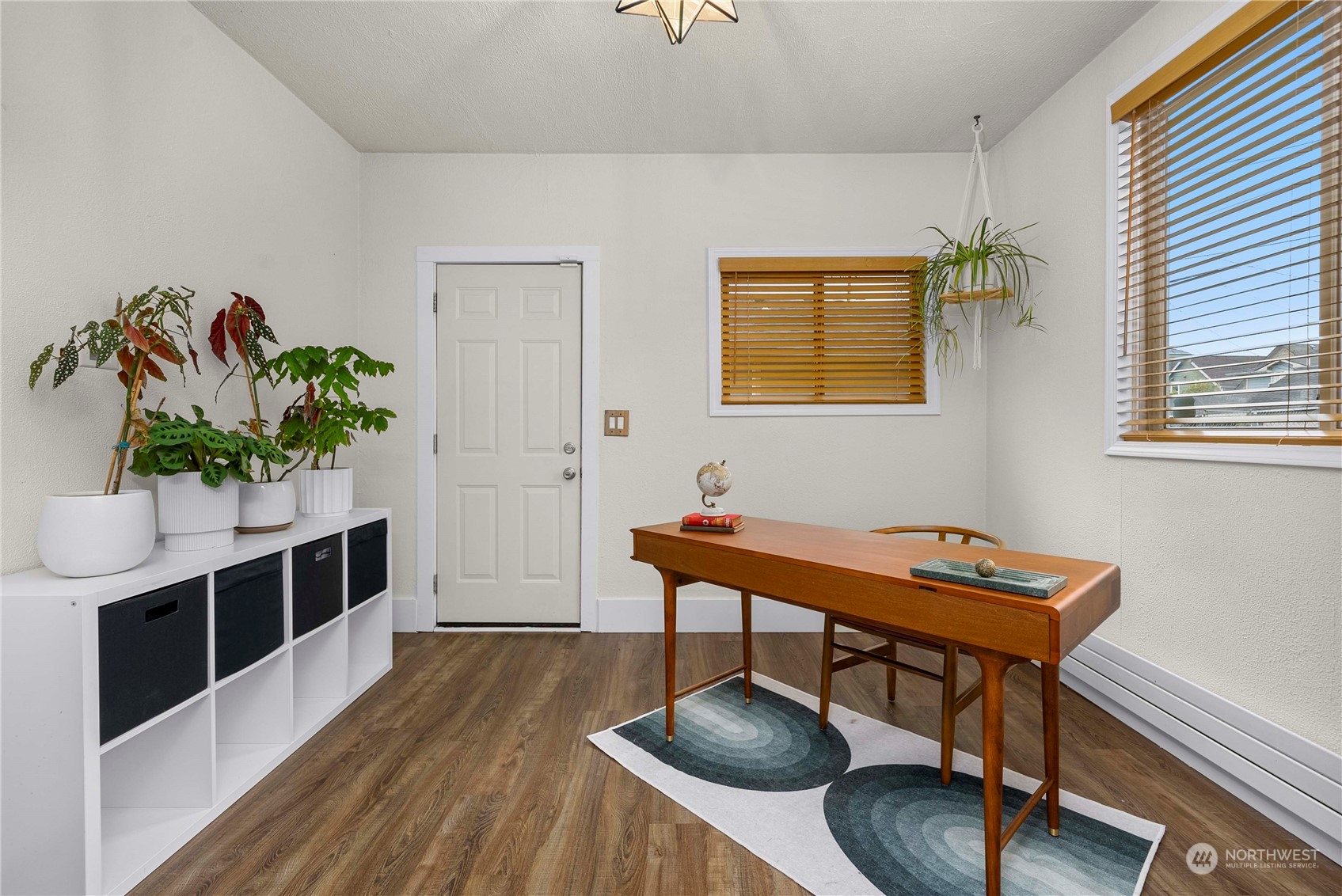 2510 Rockefeller Avenue Everett, WA 98201 - Photo 17 of 40 a reading room with furniture and a potted plant