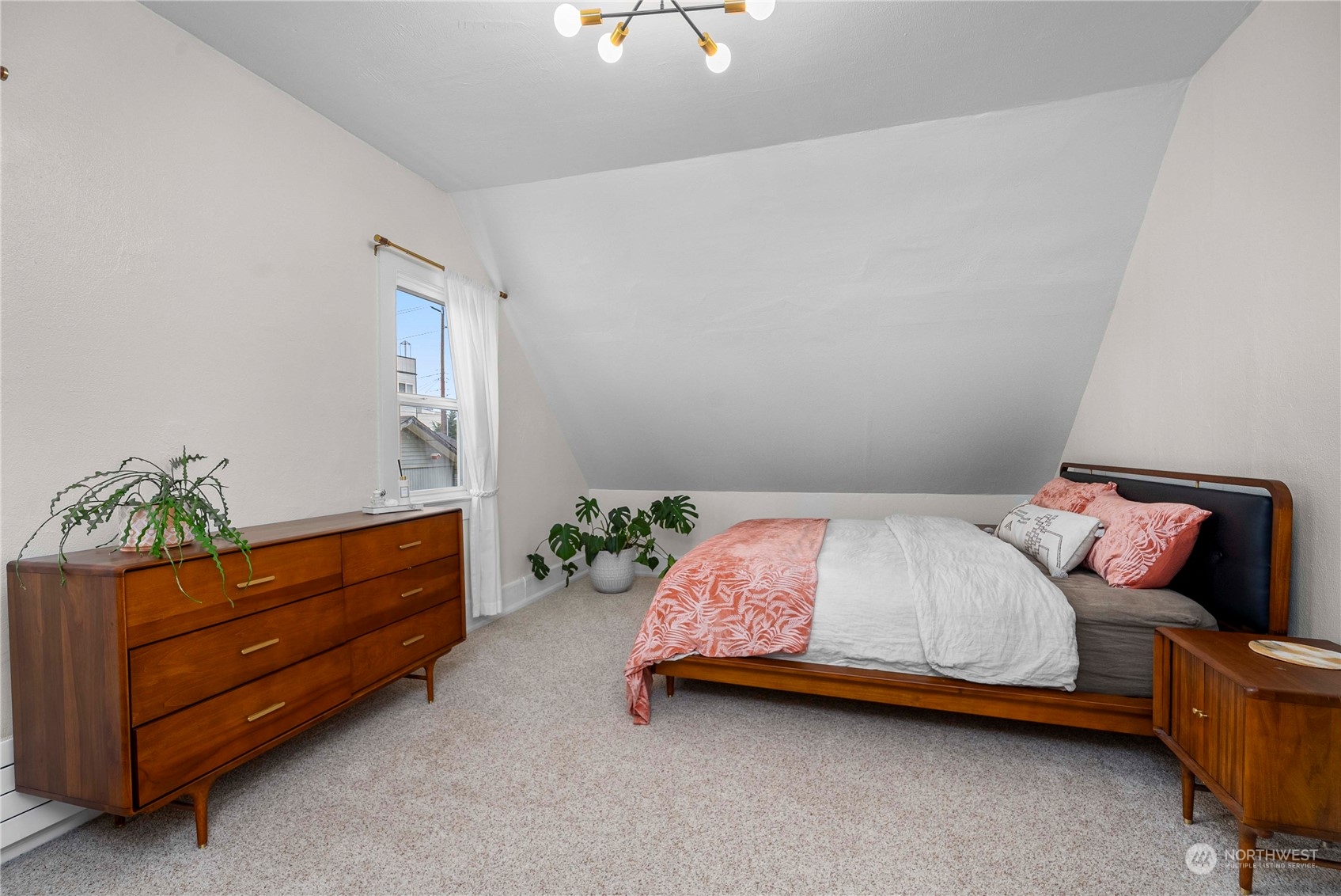 2510 Rockefeller Avenue Everett, WA 98201 - Photo 26 of 40 a bedroom with a bed and a dresser