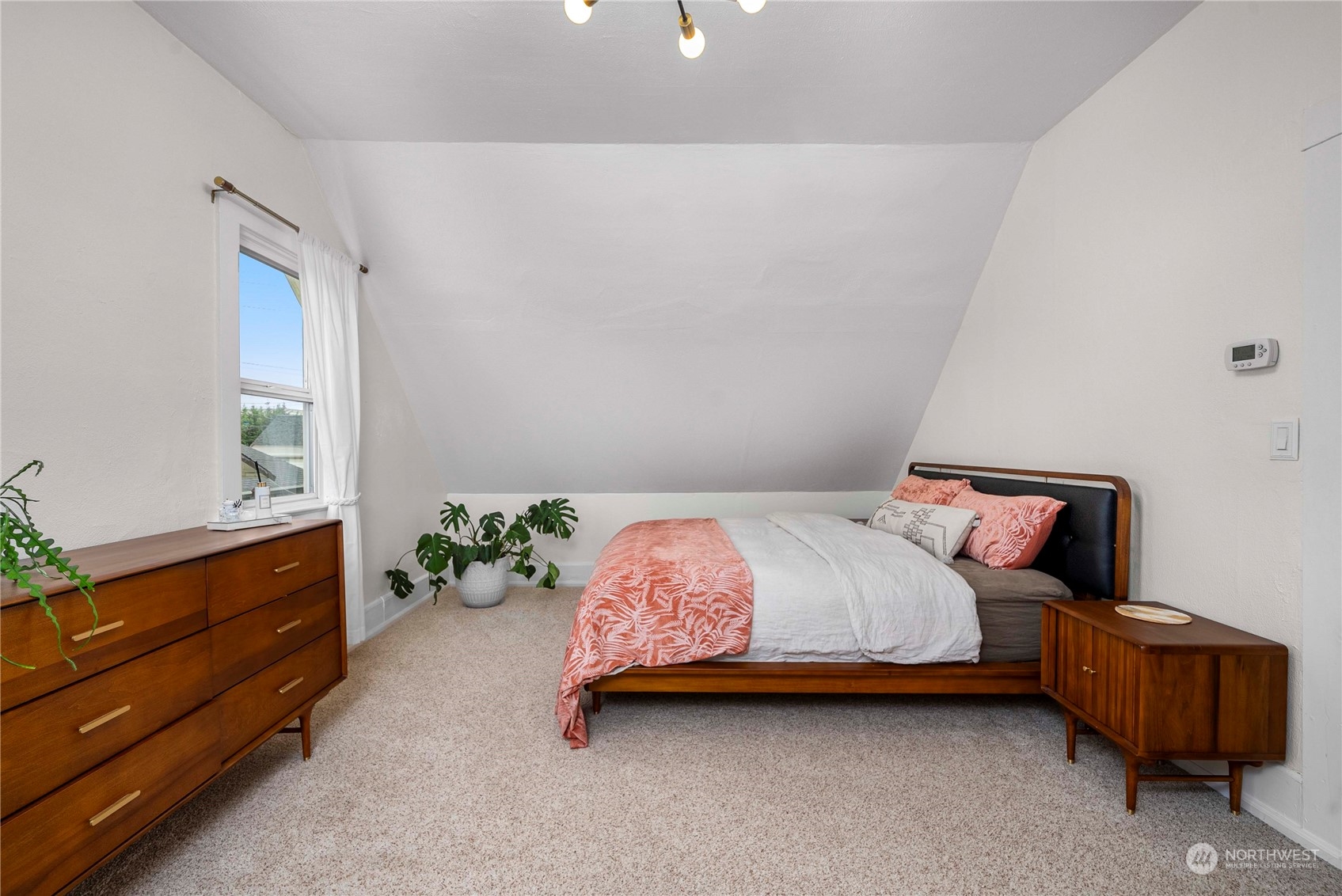 2510 Rockefeller Avenue Everett, WA 98201 - Photo 27 of 40 a bedroom with a bed and window