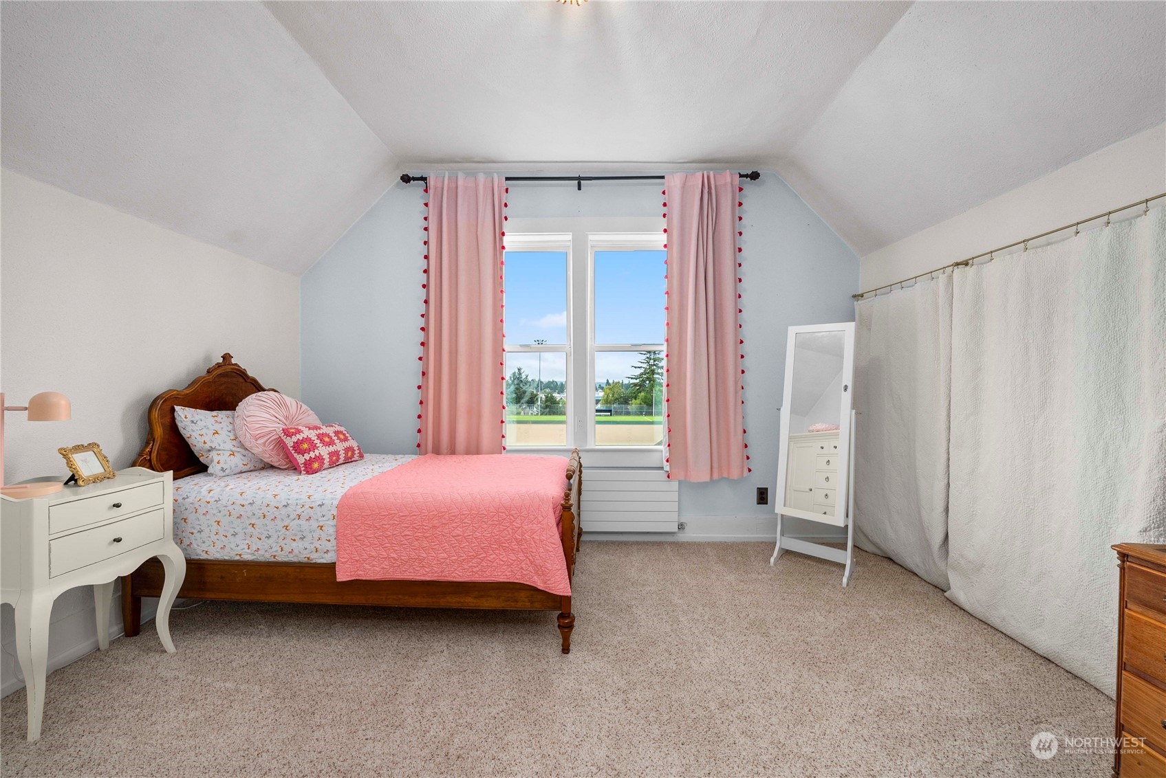 2510 Rockefeller Avenue Everett, WA 98201 - Photo 30 of 40 a bedroom with a bed and a window