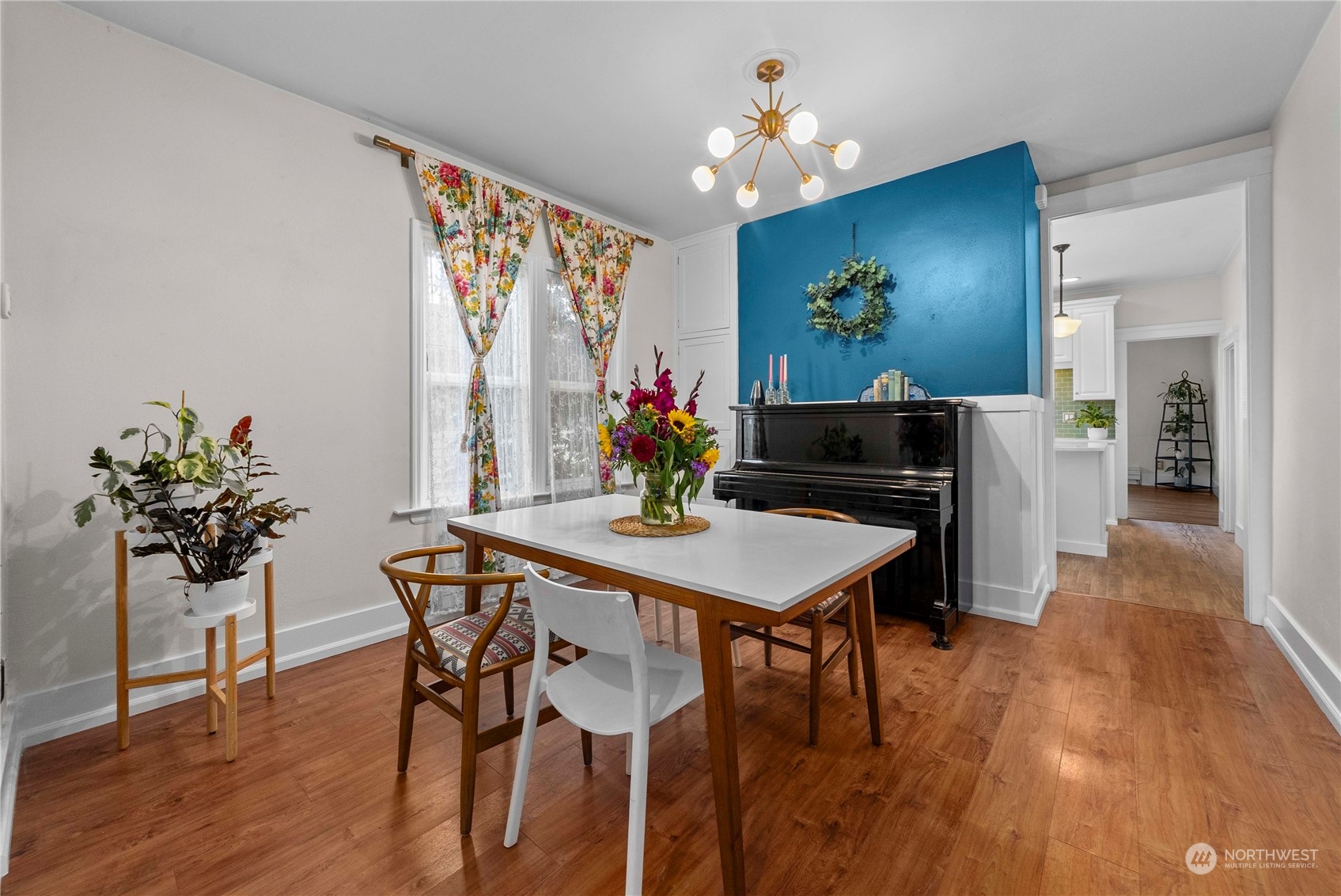 2510 Rockefeller Avenue Everett, WA 98201 - Photo 7 of 40 a view of a dining room with furniture and wooden floor