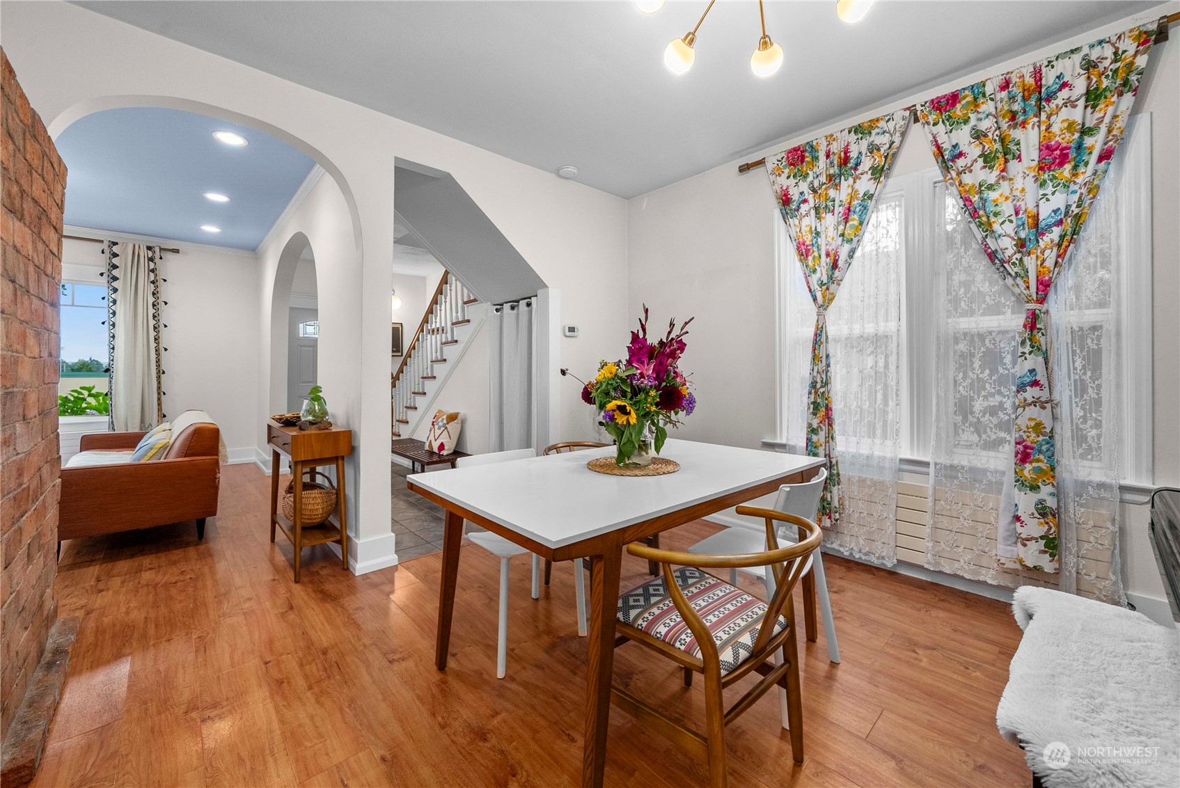 2510 Rockefeller Avenue Everett, WA 98201 - Photo 8 of 40 a view of a dining room with furniture and wooden floor