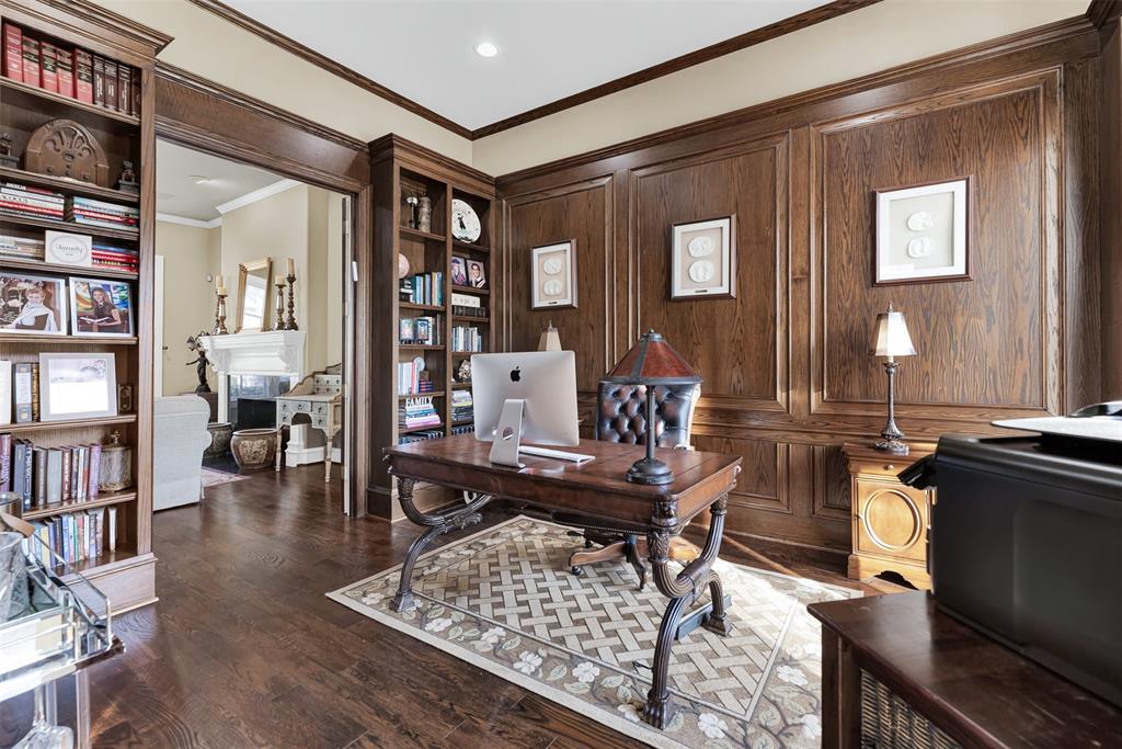 2605 Rutgers Court Plano, TX 75093 - Photo 10 of 34 Built-in bookcases in the office keeps you organized and show off your prized books! The paneling boasts intricate woodwork, as does the crown molding.