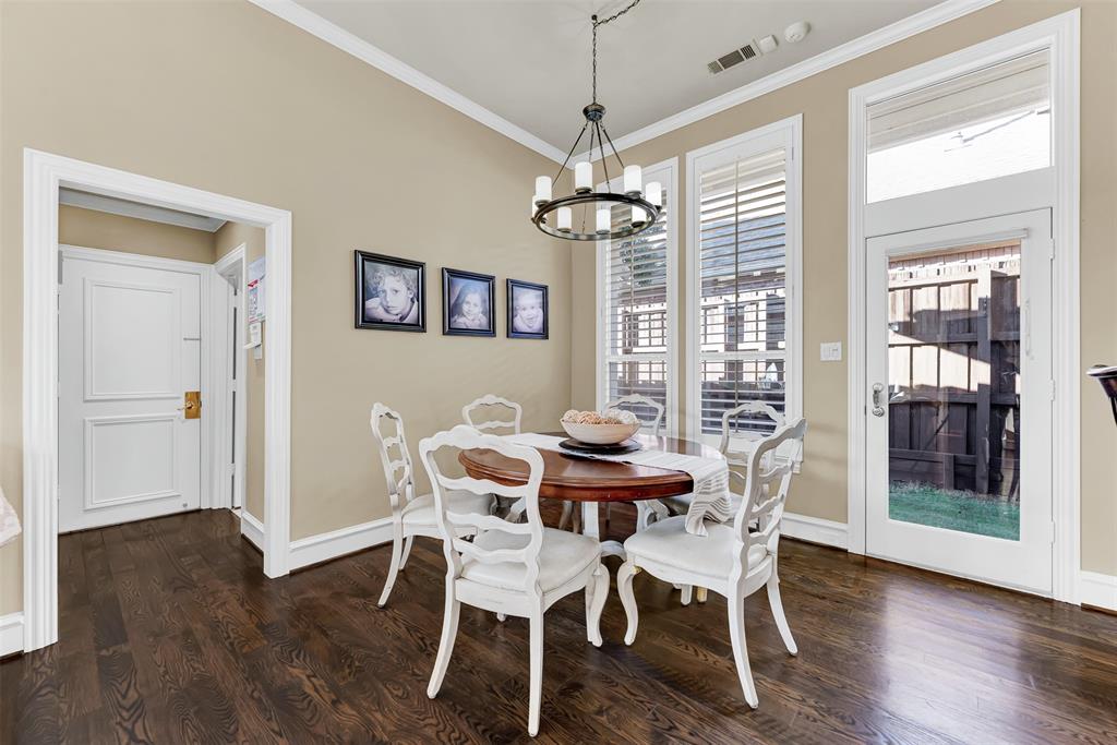2605 Rutgers Court Plano, TX 75093 - Photo 20 of 34 The light and bright breakfast nook offers not only views of the side yard, but access to the utility room and garage!