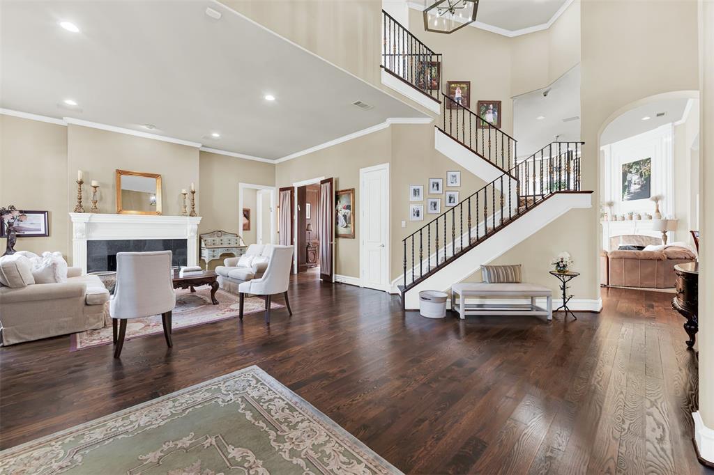 2605 Rutgers Court Plano, TX 75093 - Photo 2 of 34 This is your first view of the luxury that awaits in every room! Hardwood floors throughout, neutral paint, and a soaring foyer that highlights the impressive staircase!