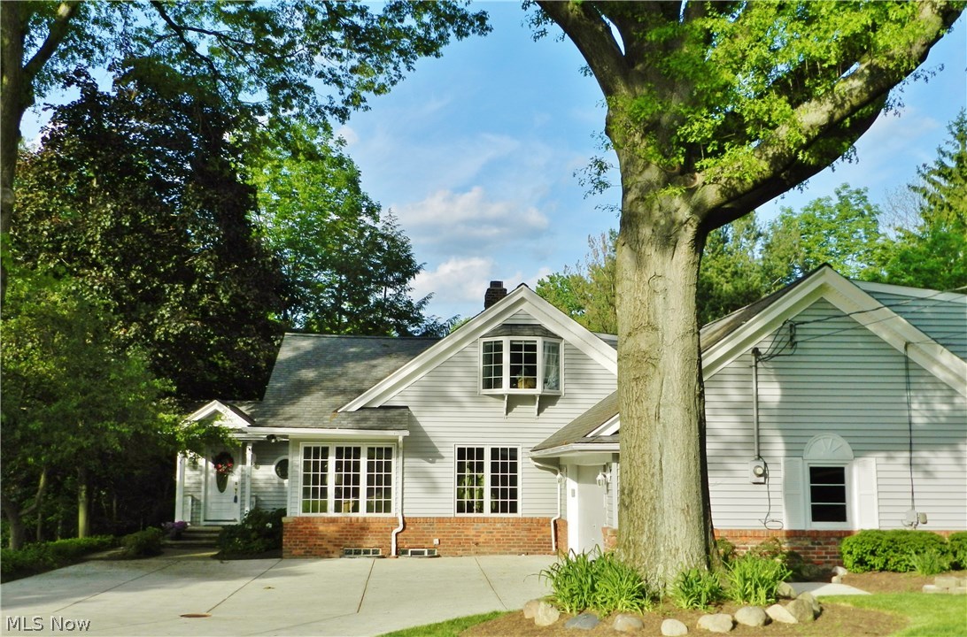 30065 Bolingbrook, a charming bungalow on a sought-after street on an outstanding lot. This home is surprisingly large w four bedrooms and baths, a vaulted ceiling great room, finished basement, and bonus studio or workroom over the garage.