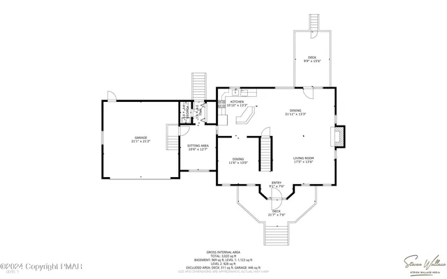 a bedroom with a bed and a potted plant