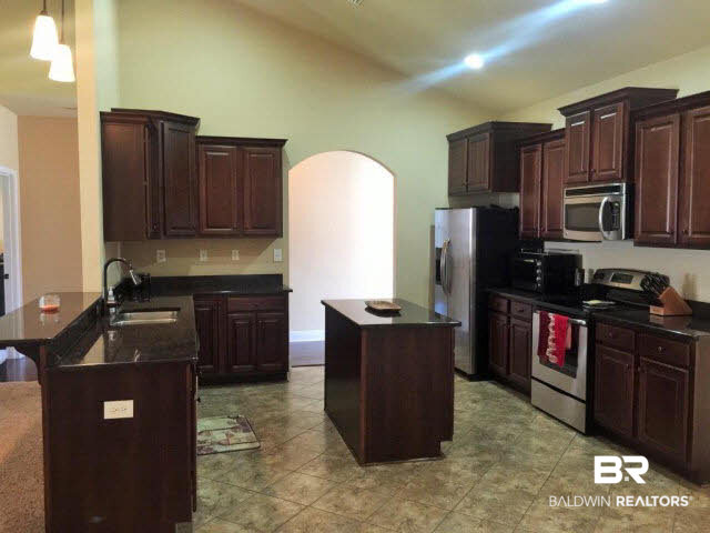 2231 Taylor Pointe Boulevard Mobile, AL 36695 - Photo 8 of 22 Large Open Concept Kitchen with granite and stainless steel appliances