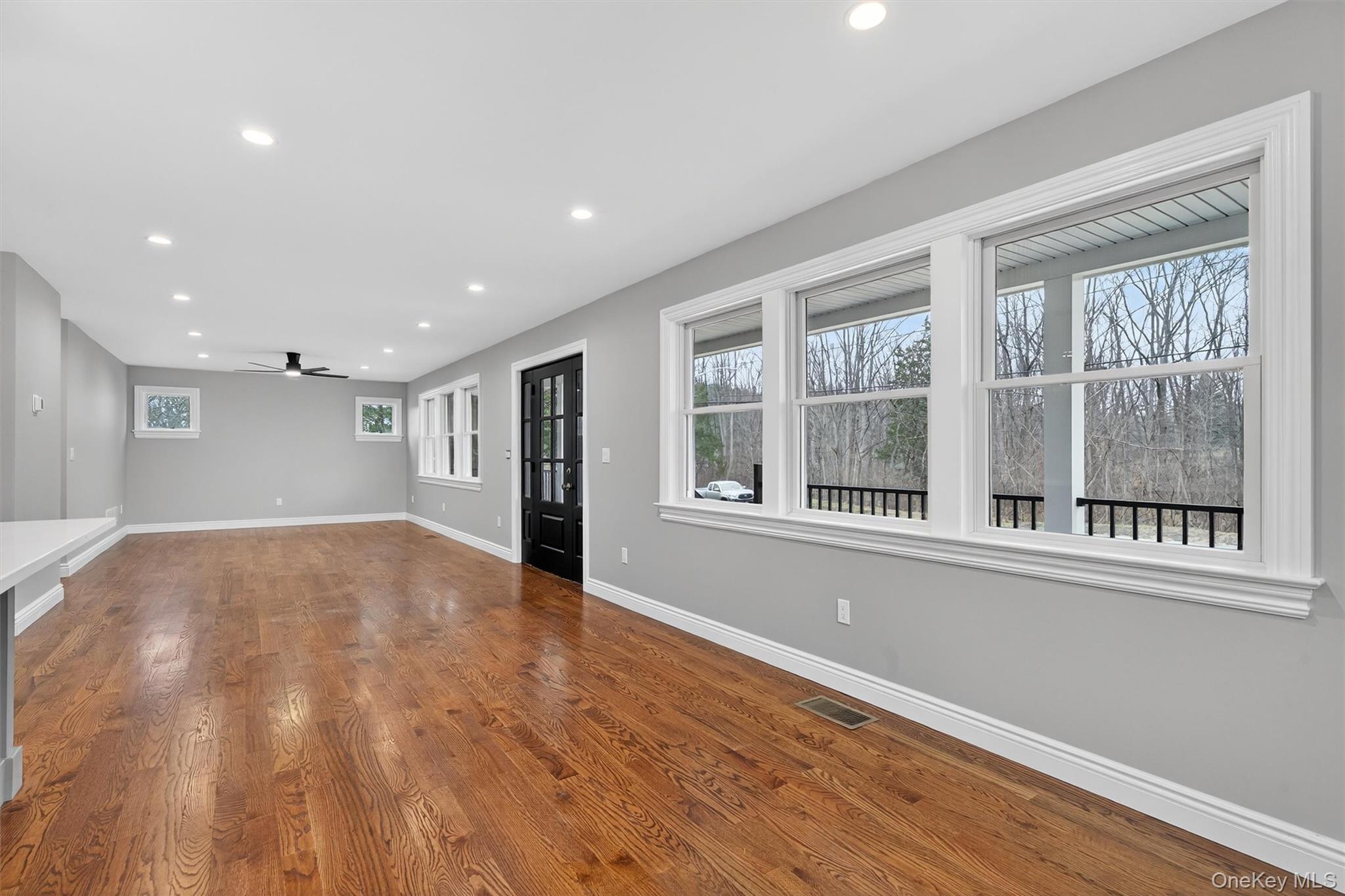 3 Little York Road Warwick, NY 10990 - Photo 16 of 39 a view of an empty room with a window and wooden floor