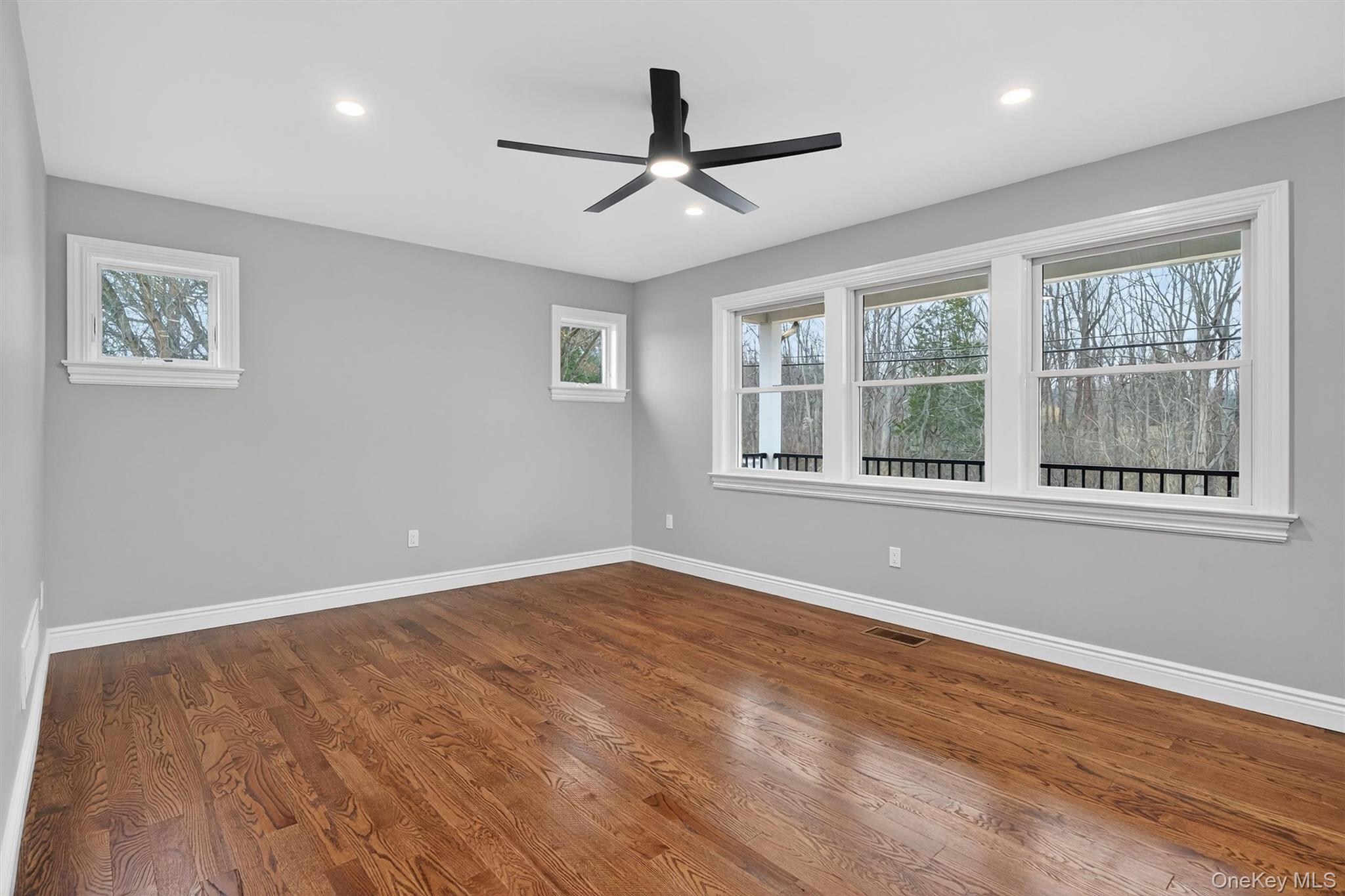3 Little York Road Warwick, NY 10990 - Photo 17 of 39 a view of an empty room with a window and wooden floor