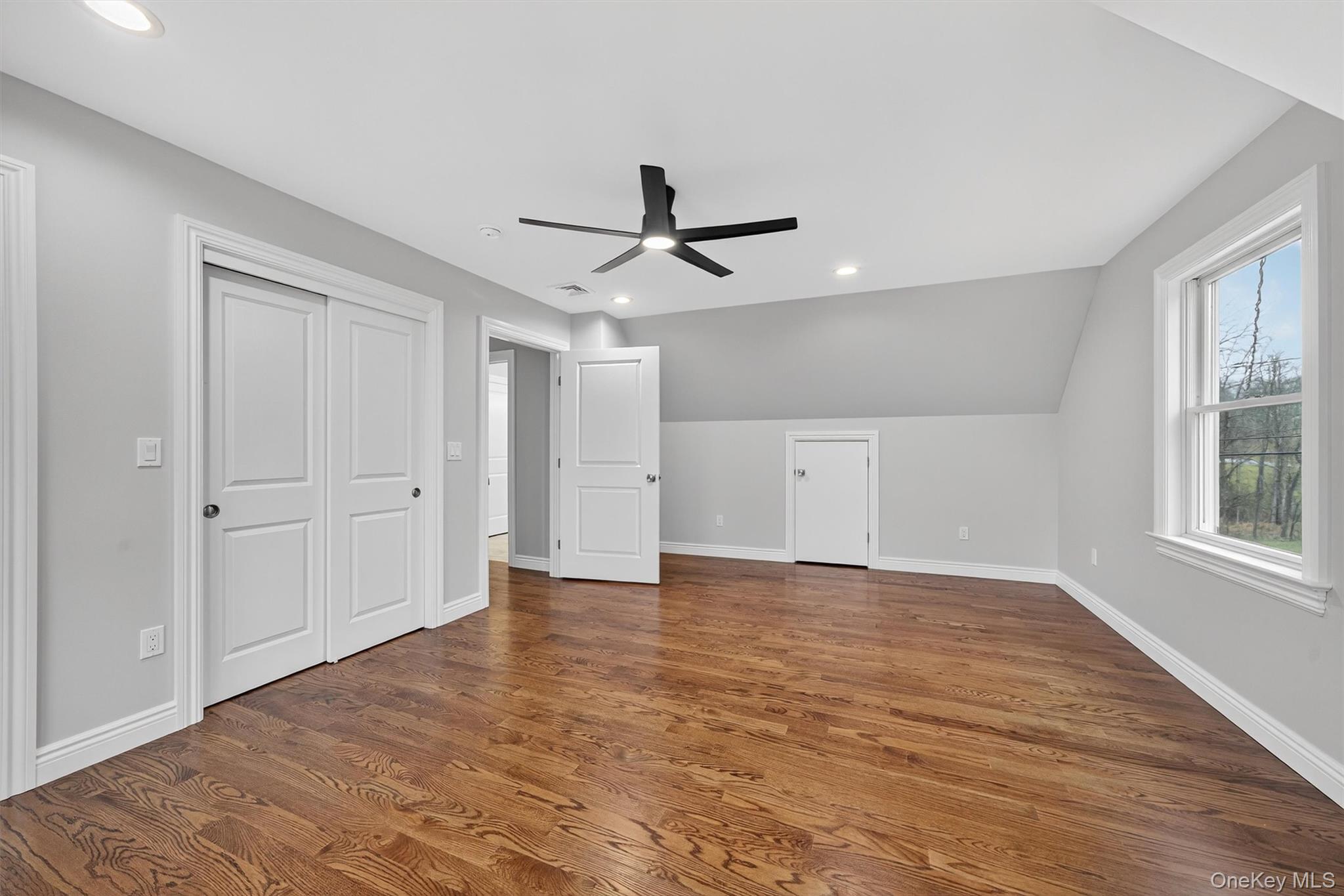 3 Little York Road Warwick, NY 10990 - Photo 28 of 39 a view of an empty room with a window and wooden floor