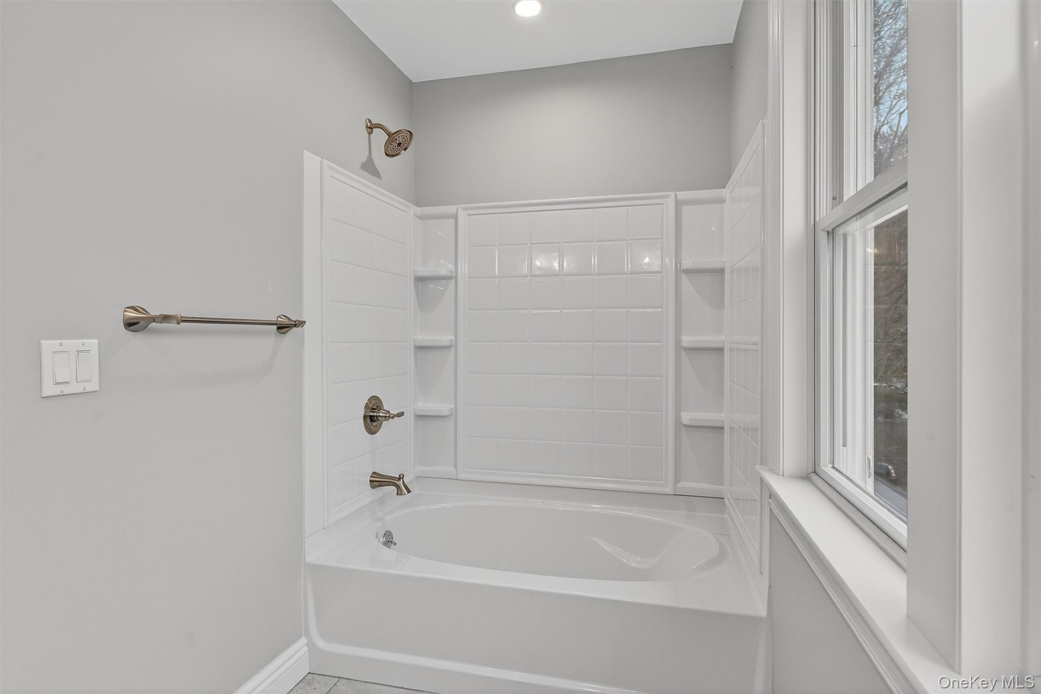 3 Little York Road Warwick, NY 10990 - Photo 32 of 39 a bathroom with a bathtub and a shower