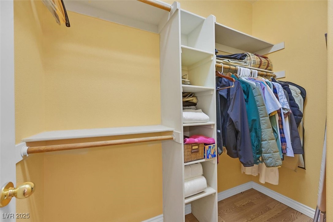 10983 Pumpkin Ridge Avenue Las Vegas, NV 89135 - Photo 18 of 35 Spacious closet with wood finished floors