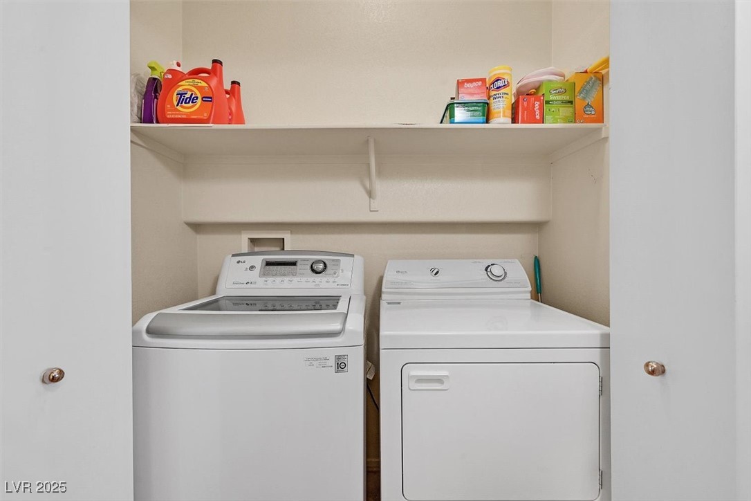 10983 Pumpkin Ridge Avenue Las Vegas, NV 89135 - Photo 25 of 35 Laundry room with laundry area and independent washer and dryer