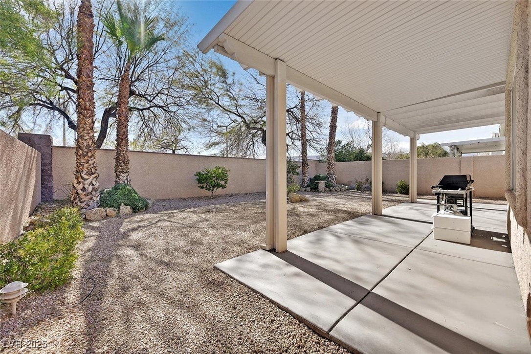 10983 Pumpkin Ridge Avenue Las Vegas, NV 89135 - Photo 26 of 35 View of patio / terrace featuring a fenced backyard