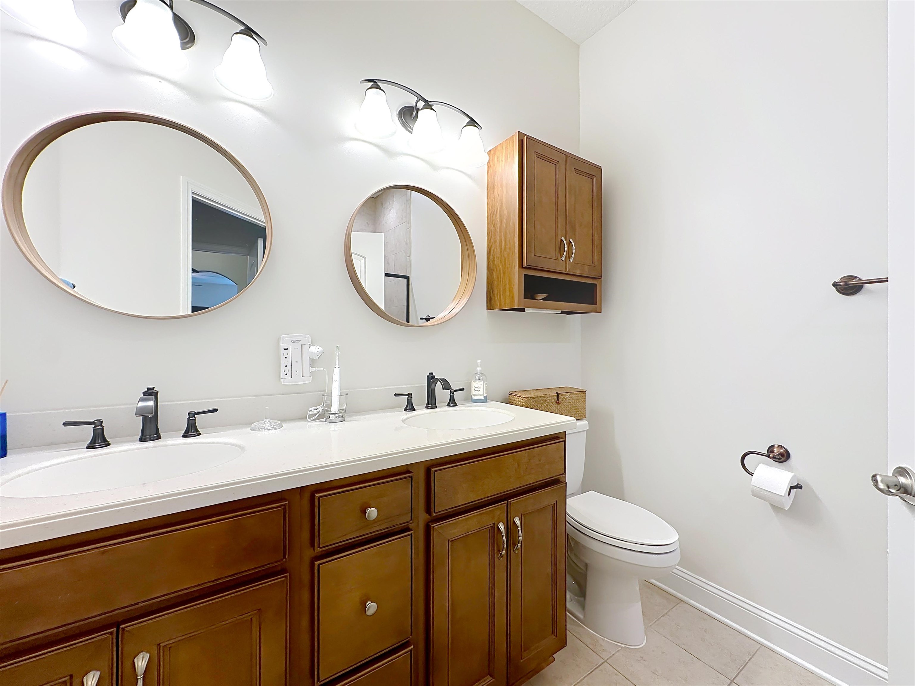 130 Grand Ravine Drive St. Augustine, FL 32086 - Photo 20 of 42 Full bathroom featuring double vanity and light tile patterned floors