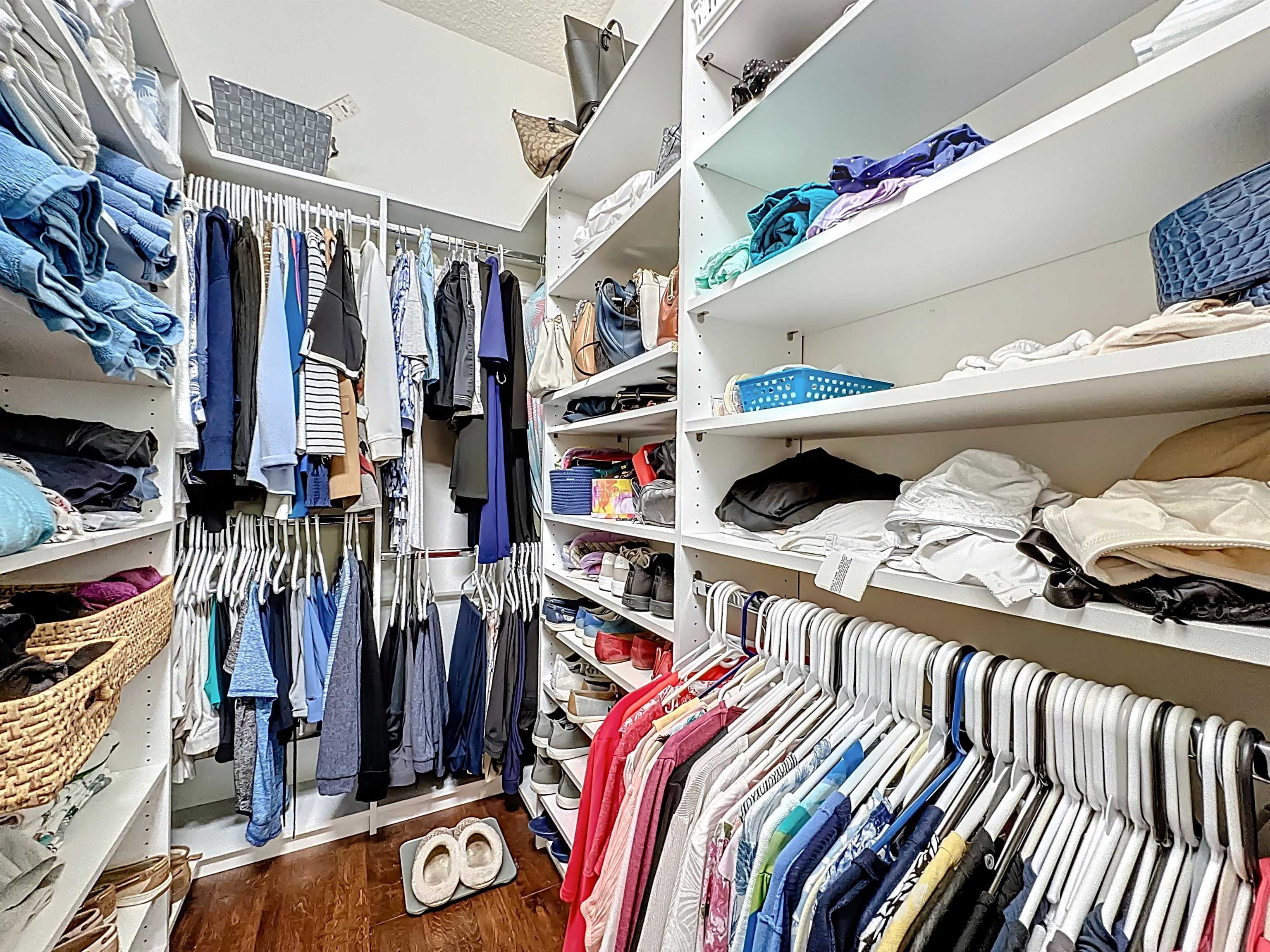 130 Grand Ravine Drive St. Augustine, FL 32086 - Photo 23 of 42 Walk in closet with dark wood-style floors