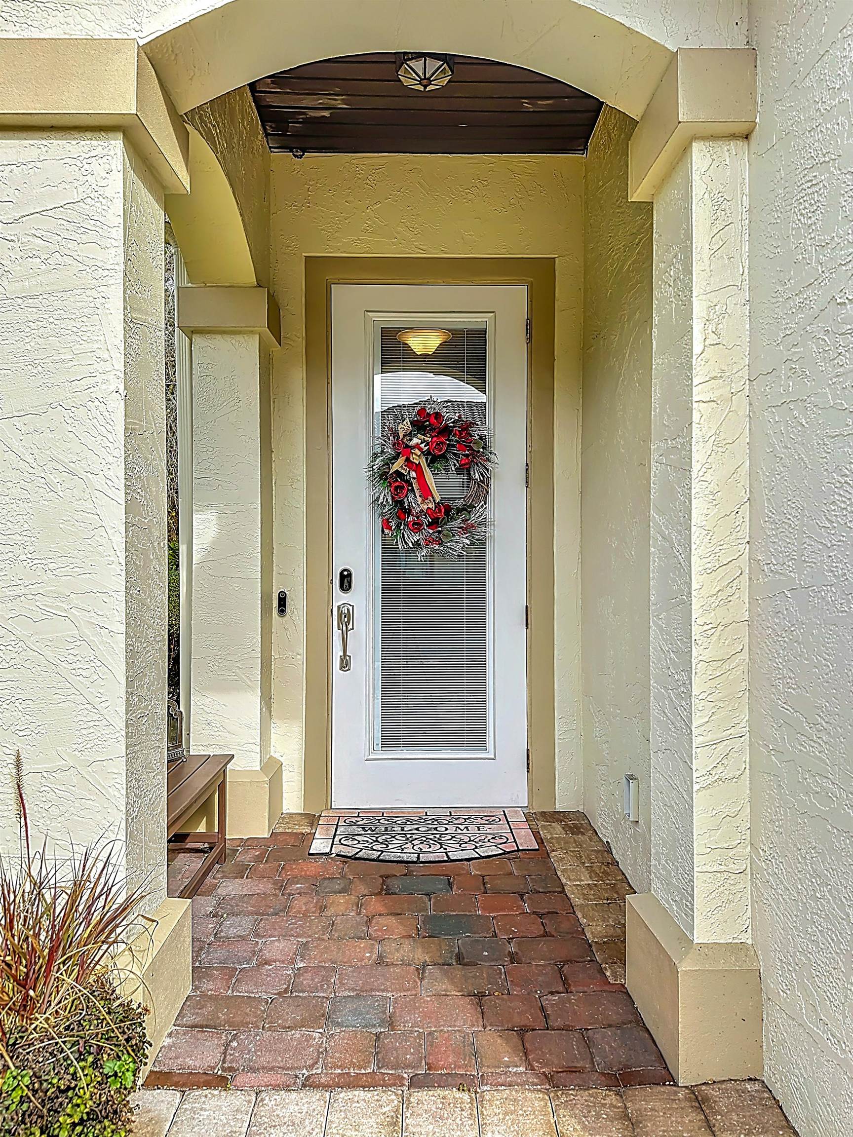 130 Grand Ravine Drive St. Augustine, FL 32086 - Photo 3 of 42 Doorway to property featuring stucco siding