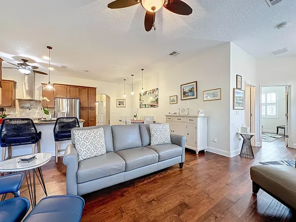 a kitchen with a dining table and chairs