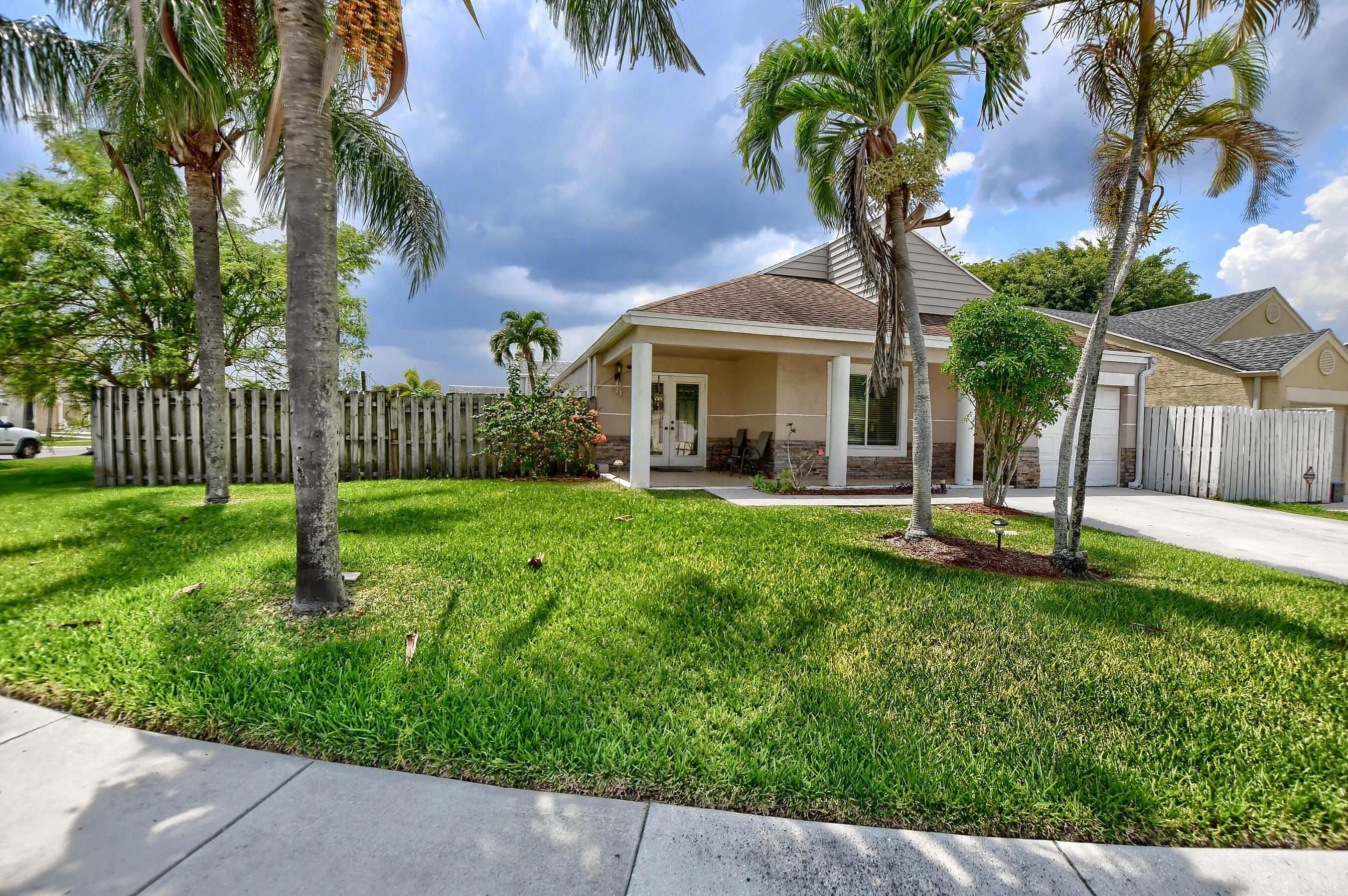 8431 Dynasty Drive Boca Raton, FL 33433 - Photo 1 of 32 Front