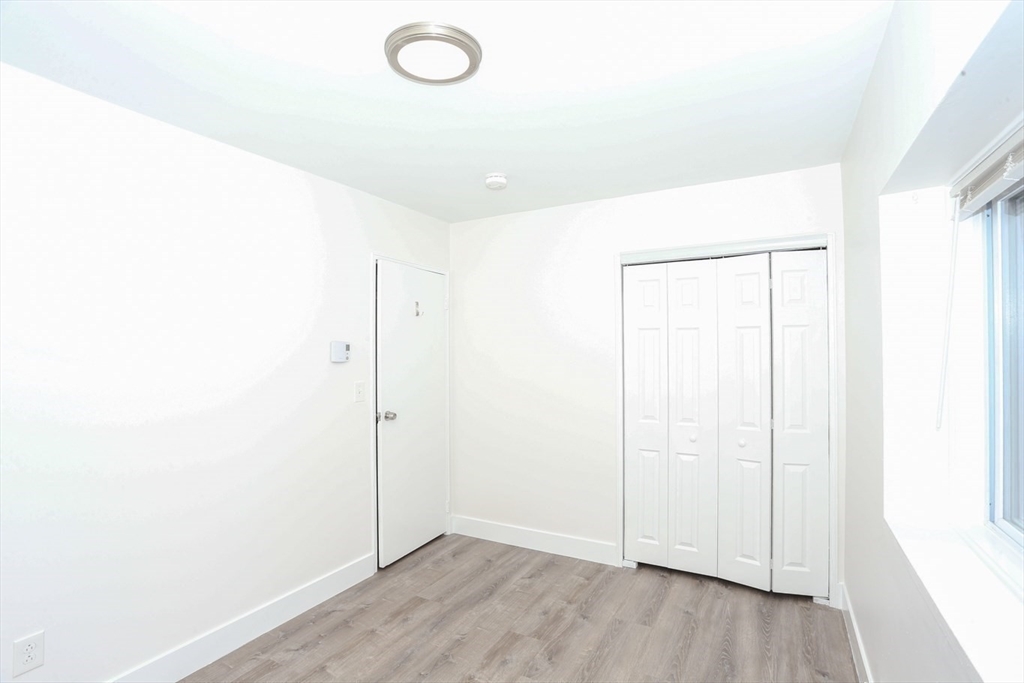 461 Washington Street, Unit 301 Boston, MA 02135 - Photo 10 of 13 a view of an empty room