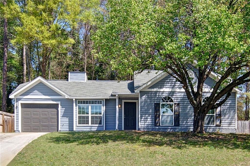 2665 Ivydale Court Southwest Atlanta, GA 30311 - Photo 1 of 45 front view of a house with a yard