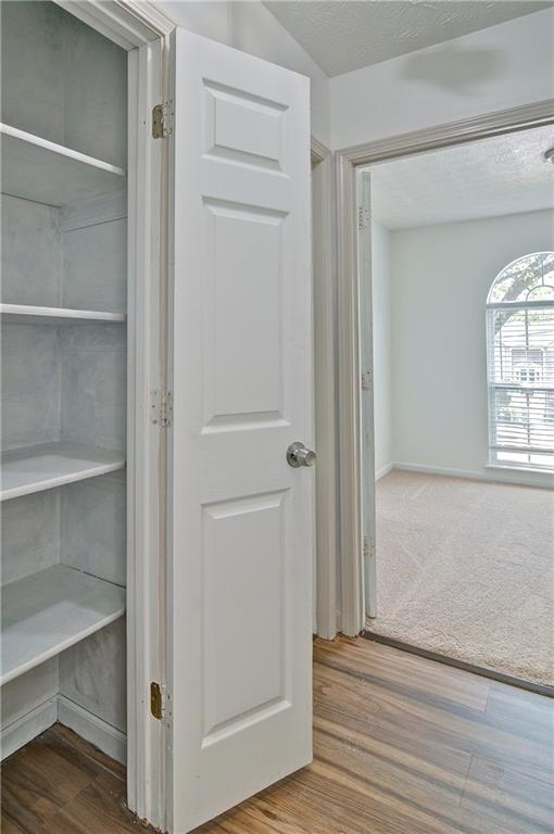2665 Ivydale Court Southwest Atlanta, GA 30311 - Photo 27 of 45 a view of empty room with wooden floor and fan