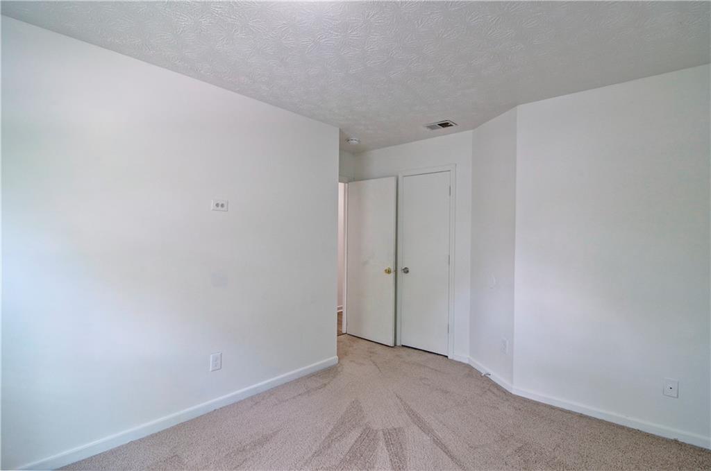 2665 Ivydale Court Southwest Atlanta, GA 30311 - Photo 31 of 45 a view of an empty room