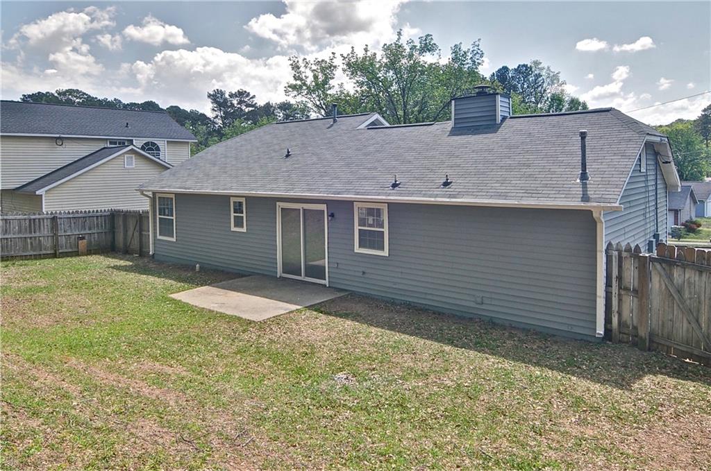 2665 Ivydale Court Southwest Atlanta, GA 30311 - Photo 40 of 45 a house view with a backyard space
