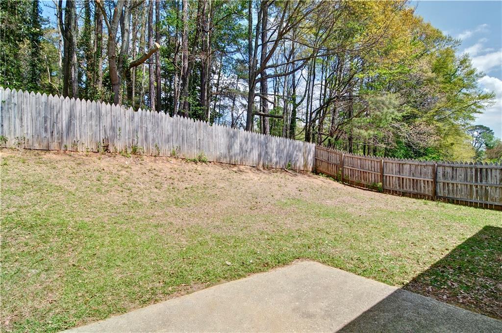 2665 Ivydale Court Southwest Atlanta, GA 30311 - Photo 45 of 45 a view of a backyard with wooden fence