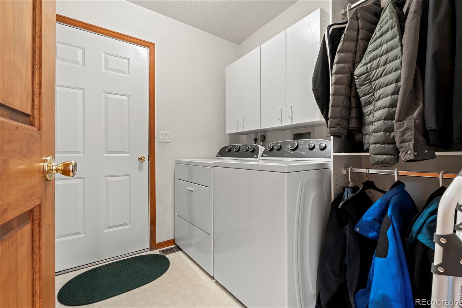 84 Marys Lane Bailey, CO 80421 - Photo 13 of 35 a view of walk in closet with clothes and shoes