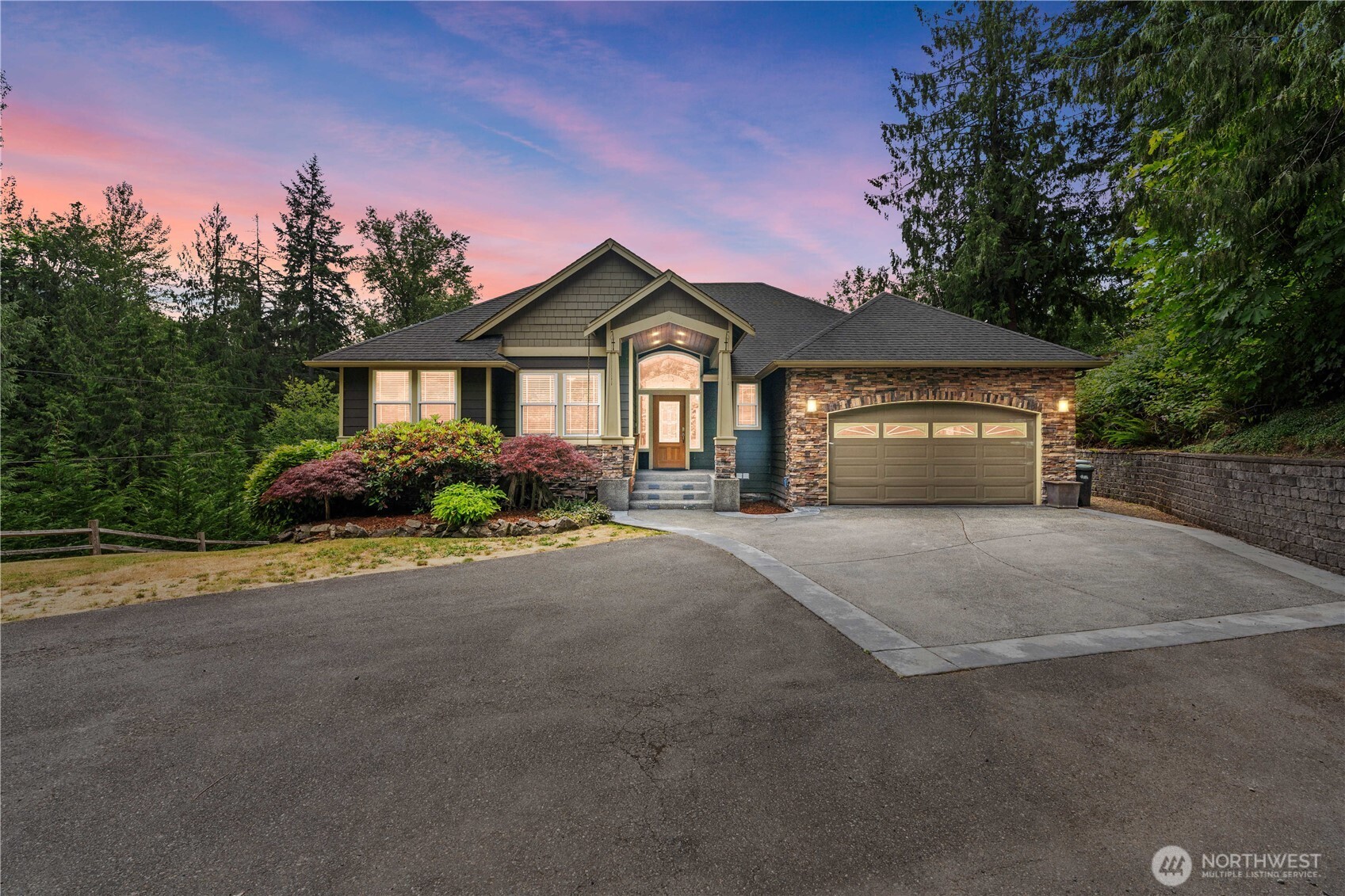 13402 Spiketon Road Buckley, WA 98321 - Photo 1 of 35 a front view of a house with a yard and garage