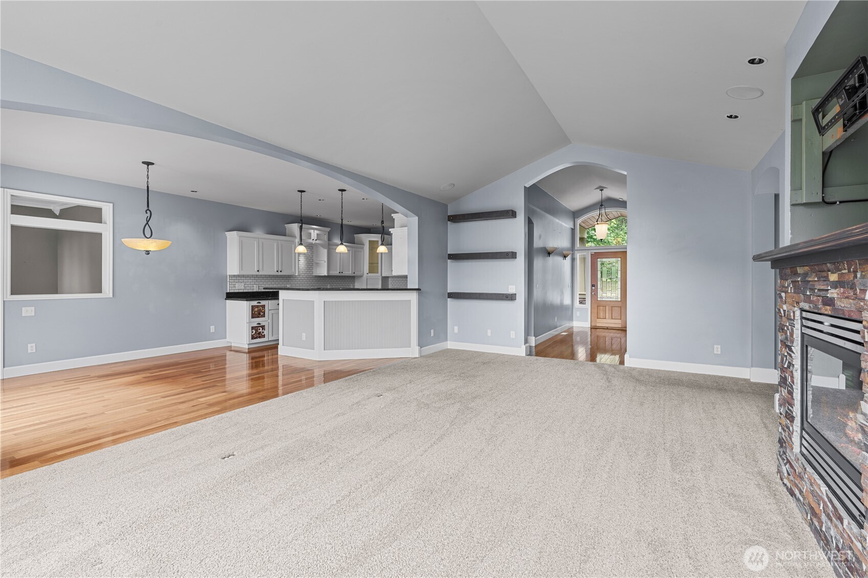 13402 Spiketon Road Buckley, WA 98321 - Photo 13 of 35 an empty room with fireplace and windows