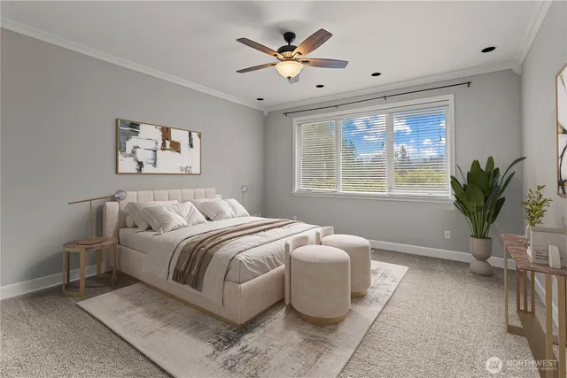 a spacious bedroom that has a bed and a potted plant