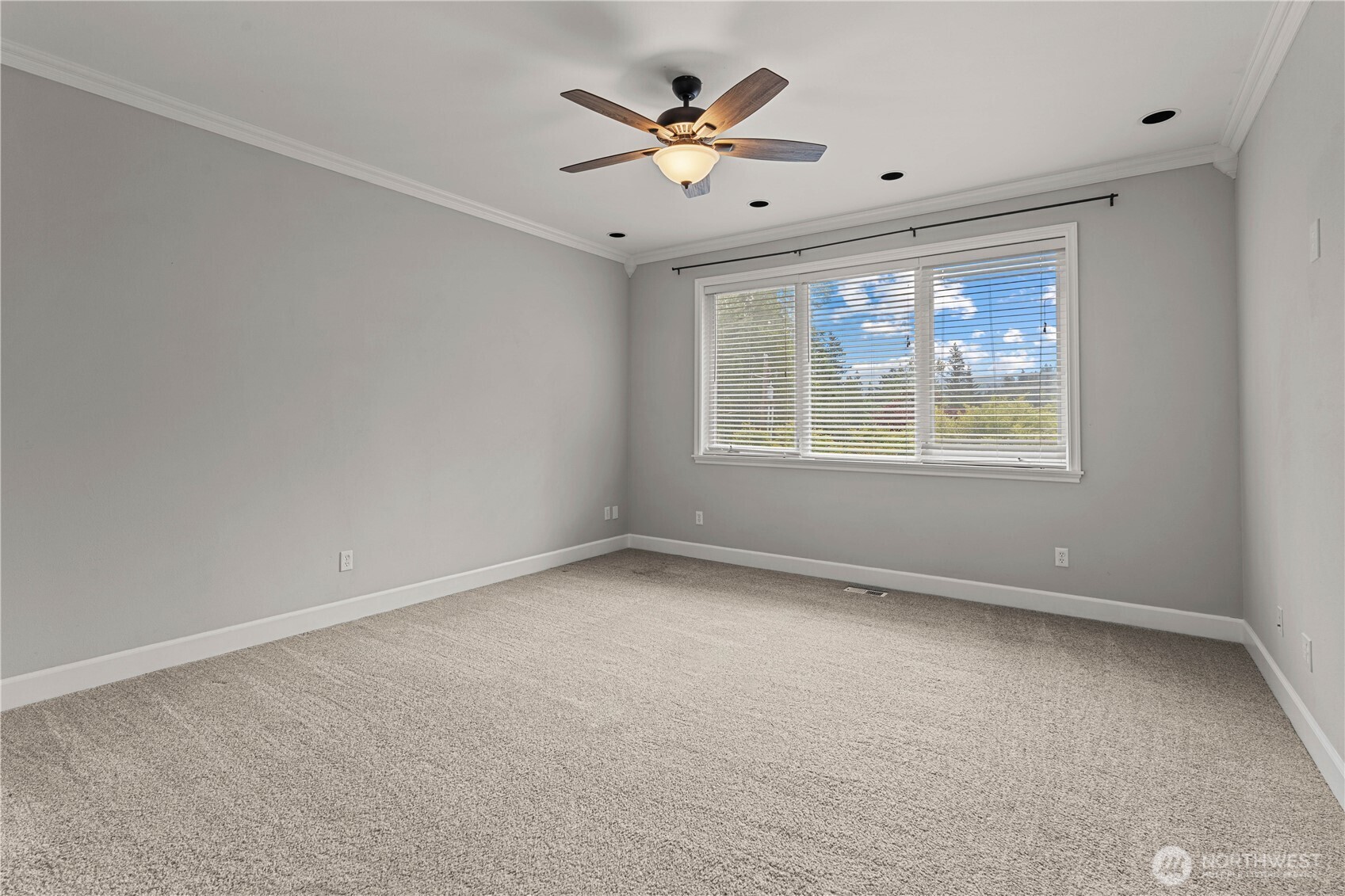 13402 Spiketon Road Buckley, WA 98321 - Photo 15 of 35 an empty room with chandelier fan and windows