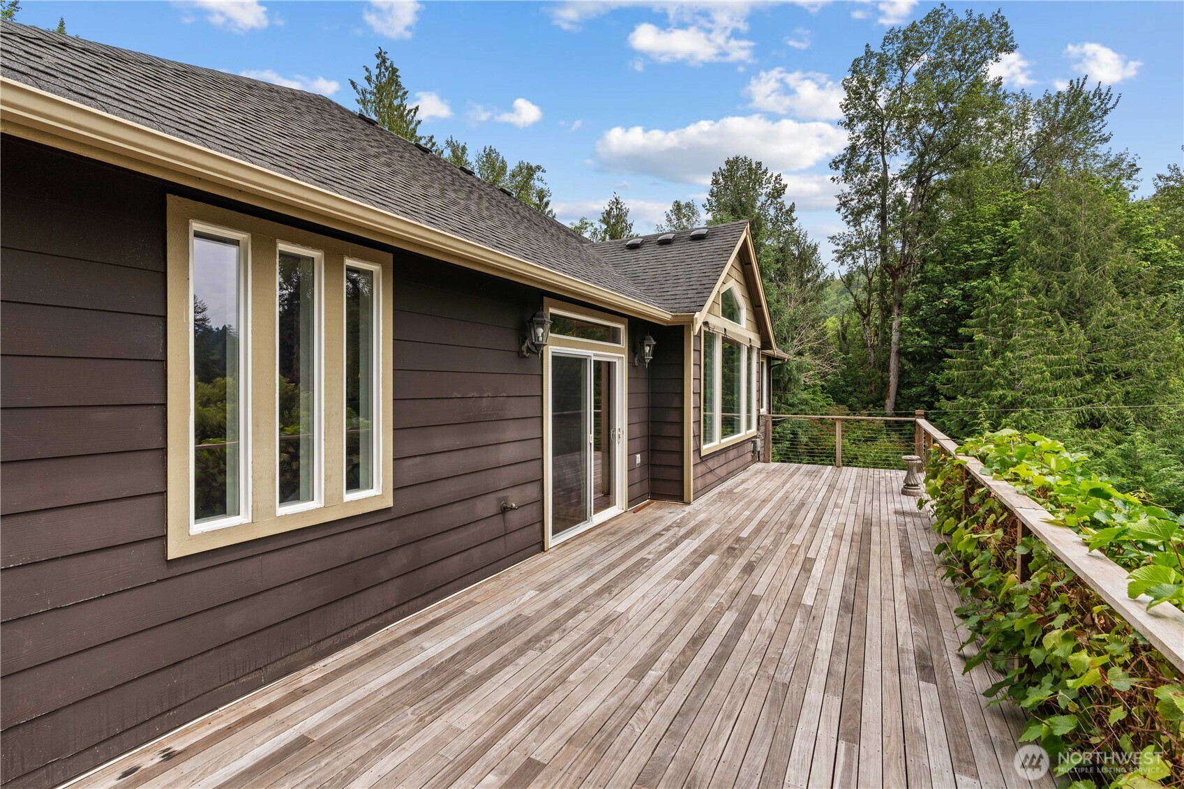 13402 Spiketon Road Buckley, WA 98321 - Photo 29 of 35 a view of backyard with deck and wooden floor
