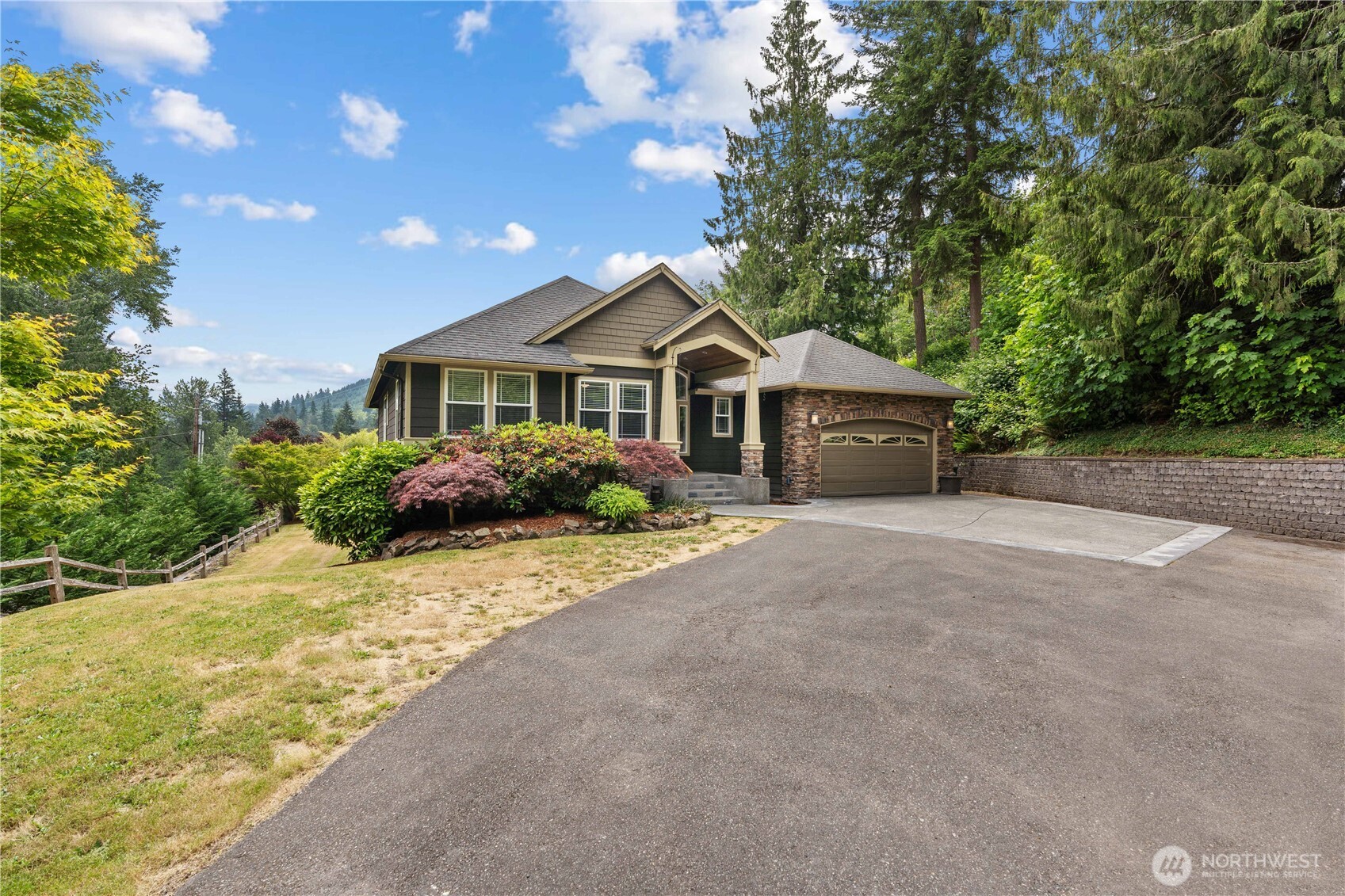13402 Spiketon Road Buckley, WA 98321 - Photo 30 of 35 a front view of a house with a yard and garage